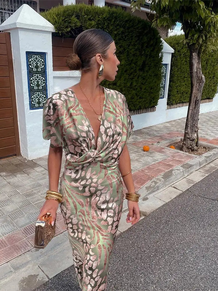 Comfortable relaxed fit women's midi dress, abstract print wrap style for summer and party wear.