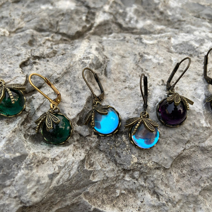 Handcrafted antique gold dragonfly earrings. Elegant vintage jewelry for women, unique nature-inspired aesthetic.