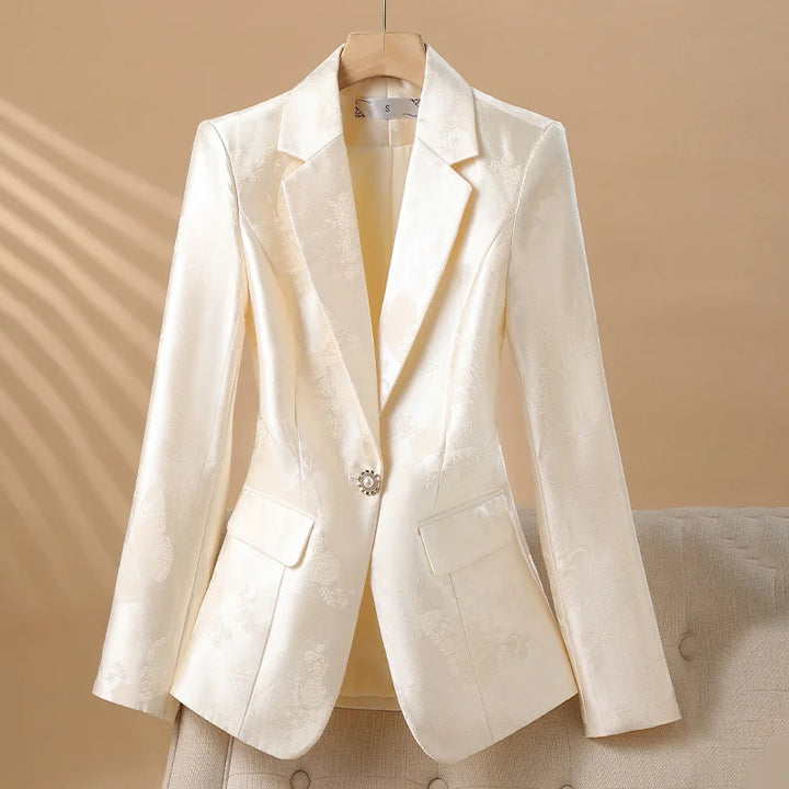 Pink elegant women's blazer with rosette detail. Luxury tailored jacket, perfect for spring fashion.