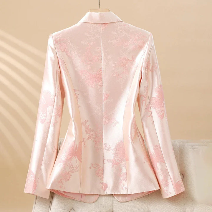 Statement women's rosette blazer in apricot. Fashionable tailored outerwear for sophisticated workwear.