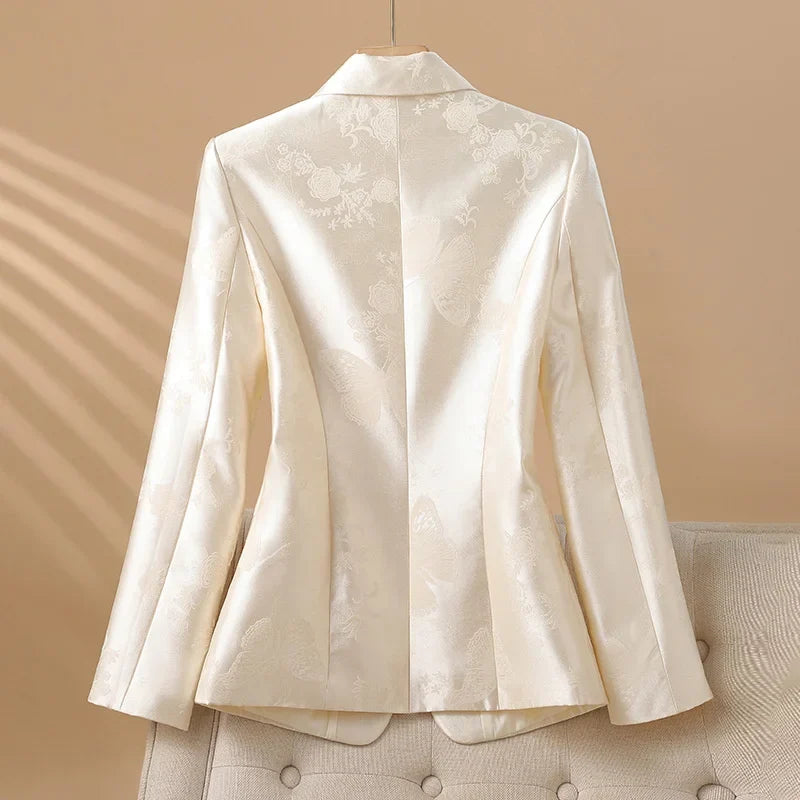 Tailored elegant pink blazer for women, featuring a beautiful rosette. Ideal for special occasions & office.