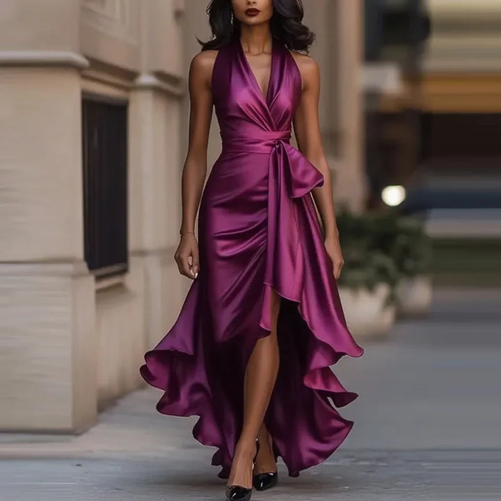 Asymmetrical off-shoulder maxi dress for women, featuring a pleated design & elegant evening wear style.