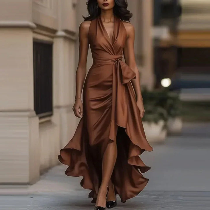 Formal women's asymmetrical off-shoulder maxi dress, an elegant evening gown for special events.
