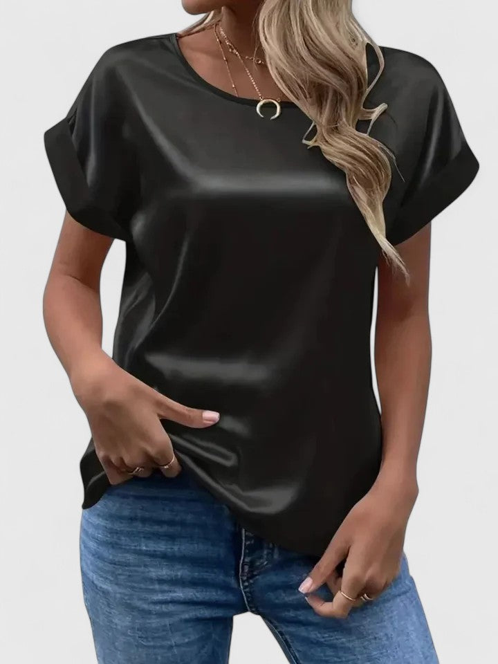 Chic women's batwing sleeve top with O-neck. Versatile elegant blouse for summer fashion, parties & work.