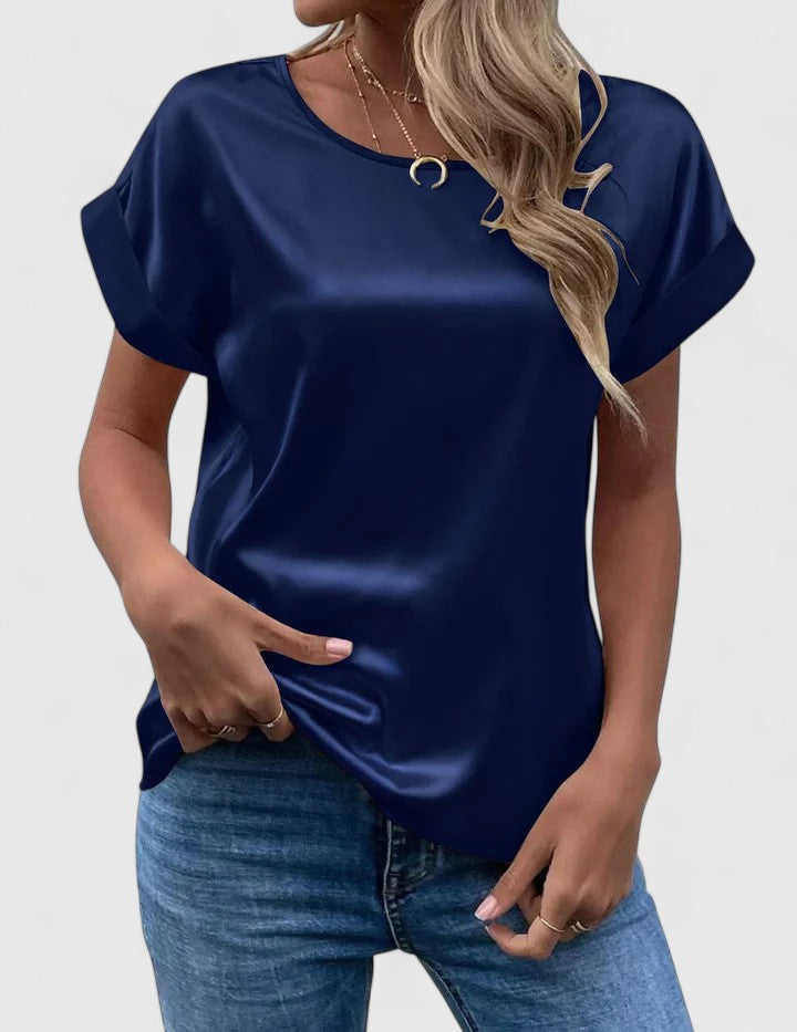Comfortable women's batwing sleeve blouse. Loose fit top, great for everyday wear or a chic office look.