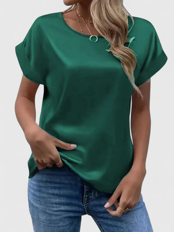 Elegant women's batwing sleeve blouse, an O-neck loose-fit top for stylish summer fashion or party wear.