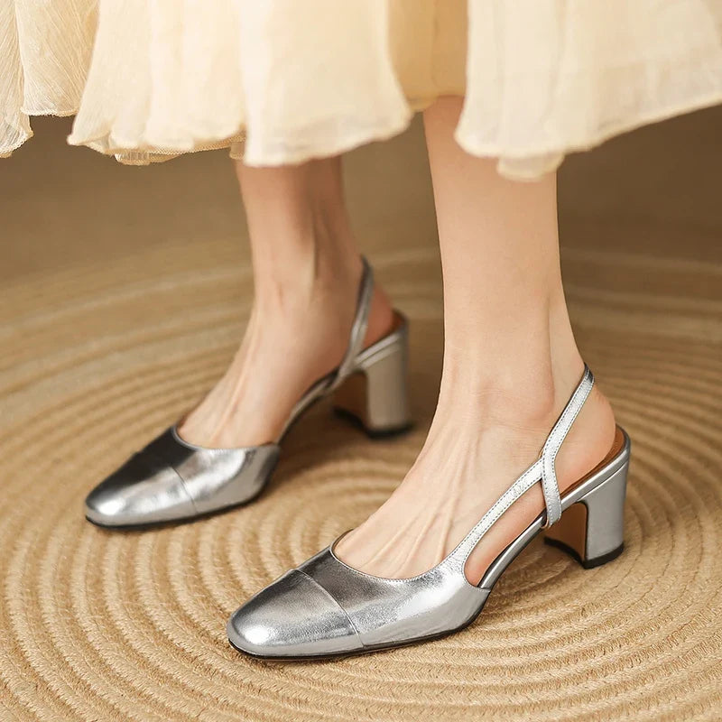 Women's comfortable elegant block heels, featuring a slingback design and round toe for classic style and all-day wear.