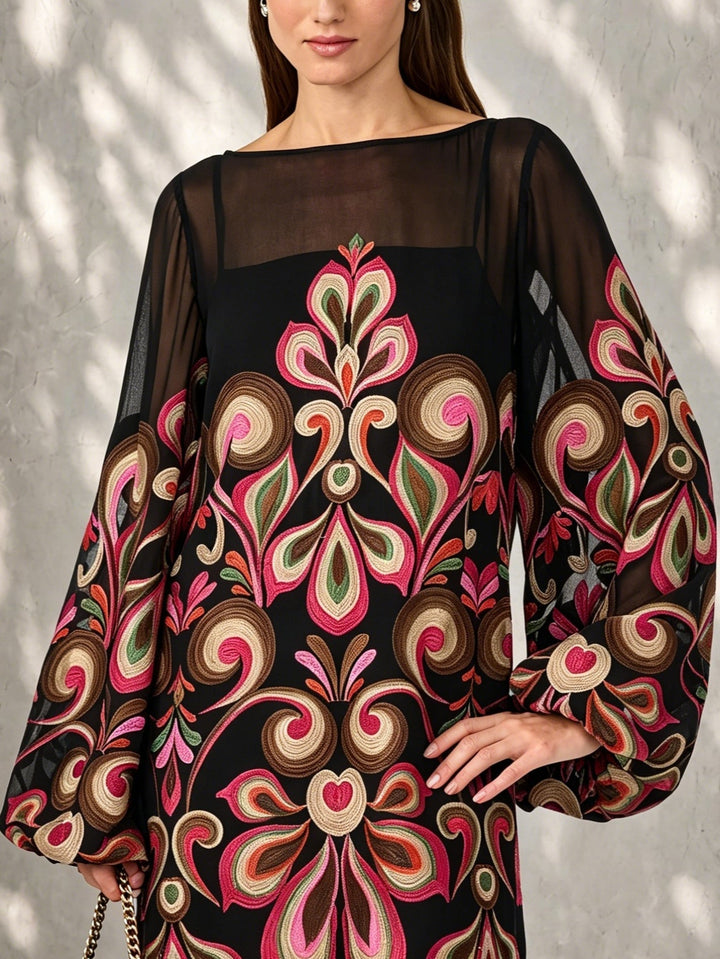 Elegant black floral mini cocktail dress featuring stylish sheer balloon sleeves and a flattering boat neck design.