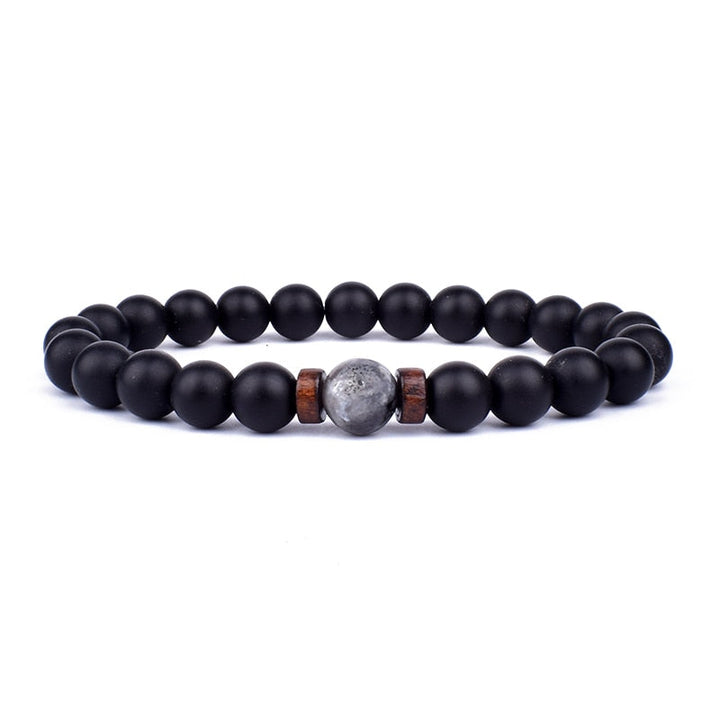 Women's elegant stone bracelet, a sophisticated black gemstone accessory for versatile fashion.