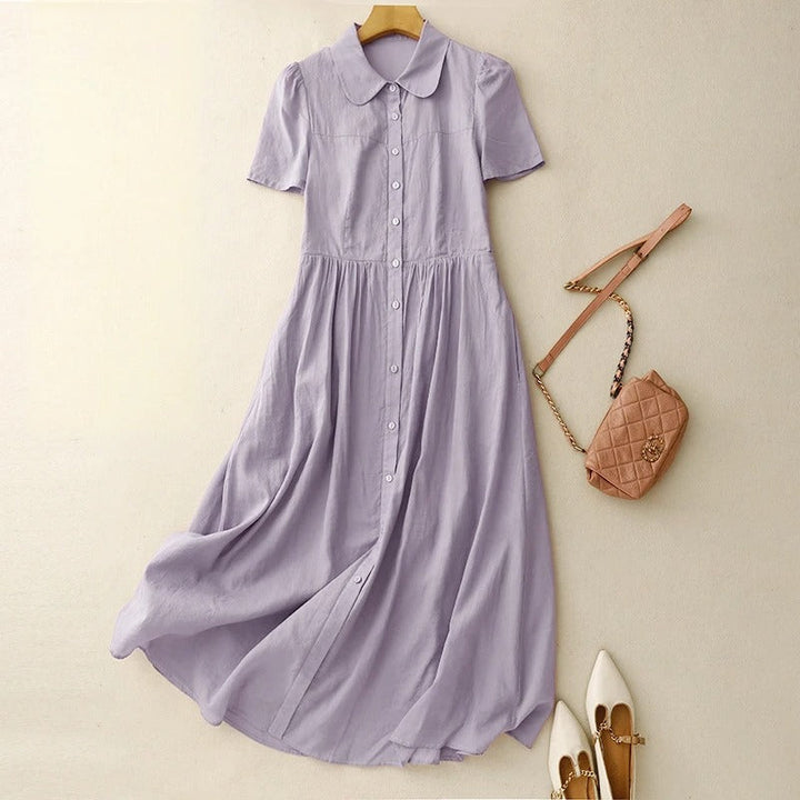 Chic women's button-front summer dress in purple, a flowy and elegant option for day wear and casual outings.