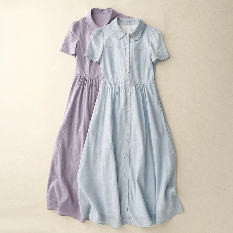 Effortless women's flowy summer dress with button-front detail, ideal for elegant day wear & vacation style.