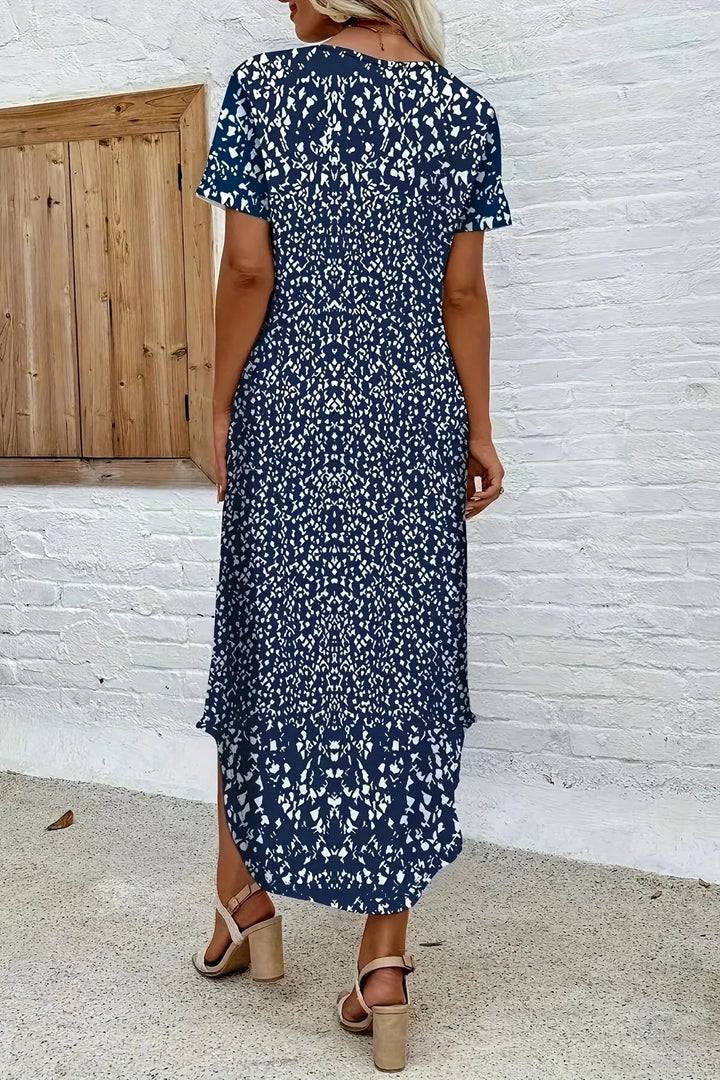 Elegant women's floral print maxi dress in blue, ideal for summer, beach, parties or casual wear.