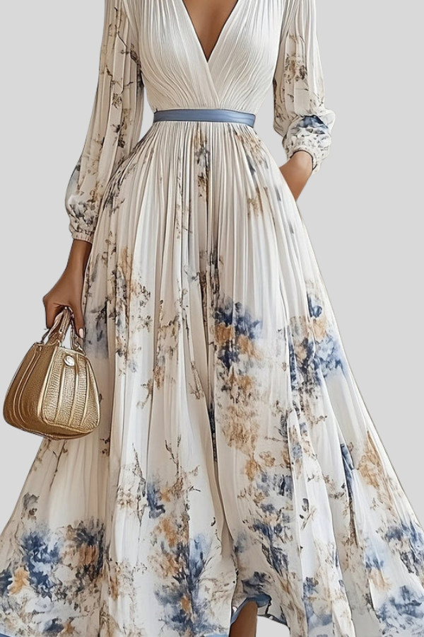 Flowy romantic bohemian midi dress for women, featuring pleats & puff sleeves, ideal for elegant spring wear.