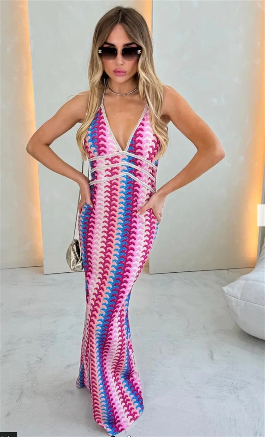 Women's elegant boho printed V-neck maxi wedding guest dress. Perfect for summer occasions.