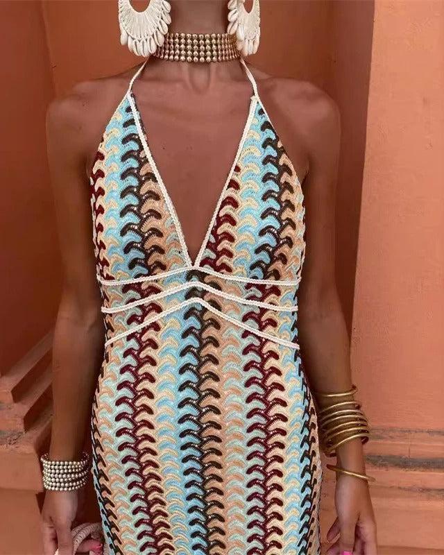 Flowing women's printed boho maxi dress with a flattering V-neck design. Excellent choice for a summer wedding guest.