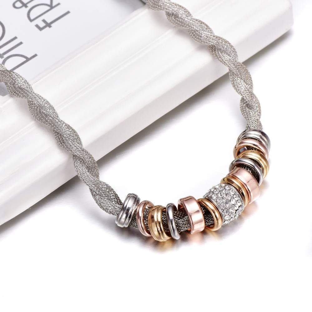 Close-up of a women's braided fashion necklace, showcasing intricate design and elegant style.