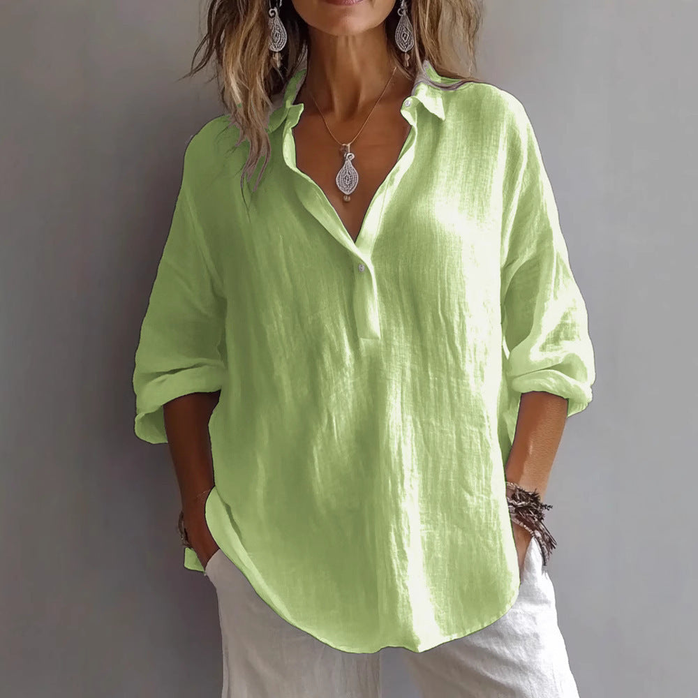 Elegant women's shirt, button-down style, wide sleeves and relaxed fit for versatile everyday fashion.