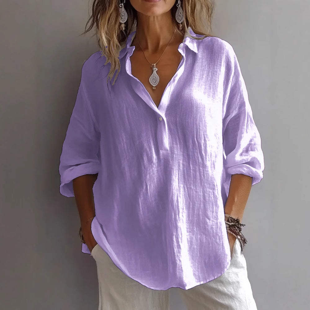 Women's relaxed fit button-down shirt with wide sleeves, a versatile casual top for everyday elegance.