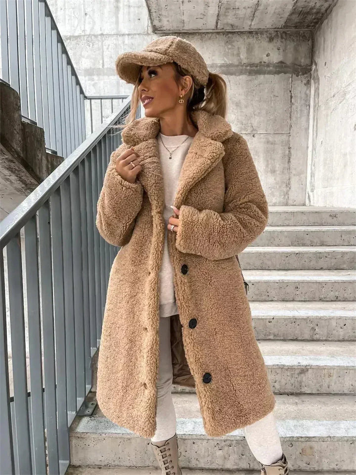 Women's elegant casual longline coat with button closure, perfect fall fashion outerwear.
