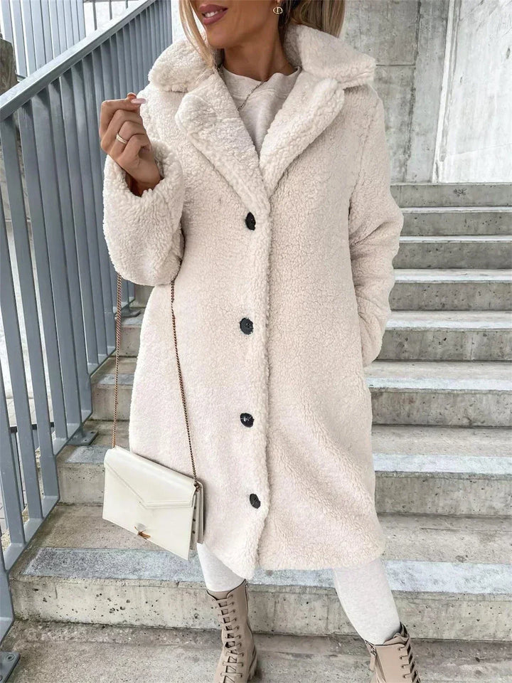 Chic women's casual long coat, perfect versatile outerwear for fall and winter style.