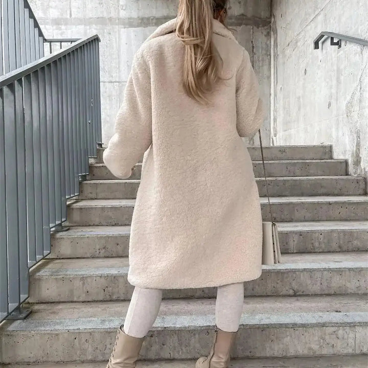 Ladies elegant longline coat, a stylish and relaxed fit jacket for fall and winter.