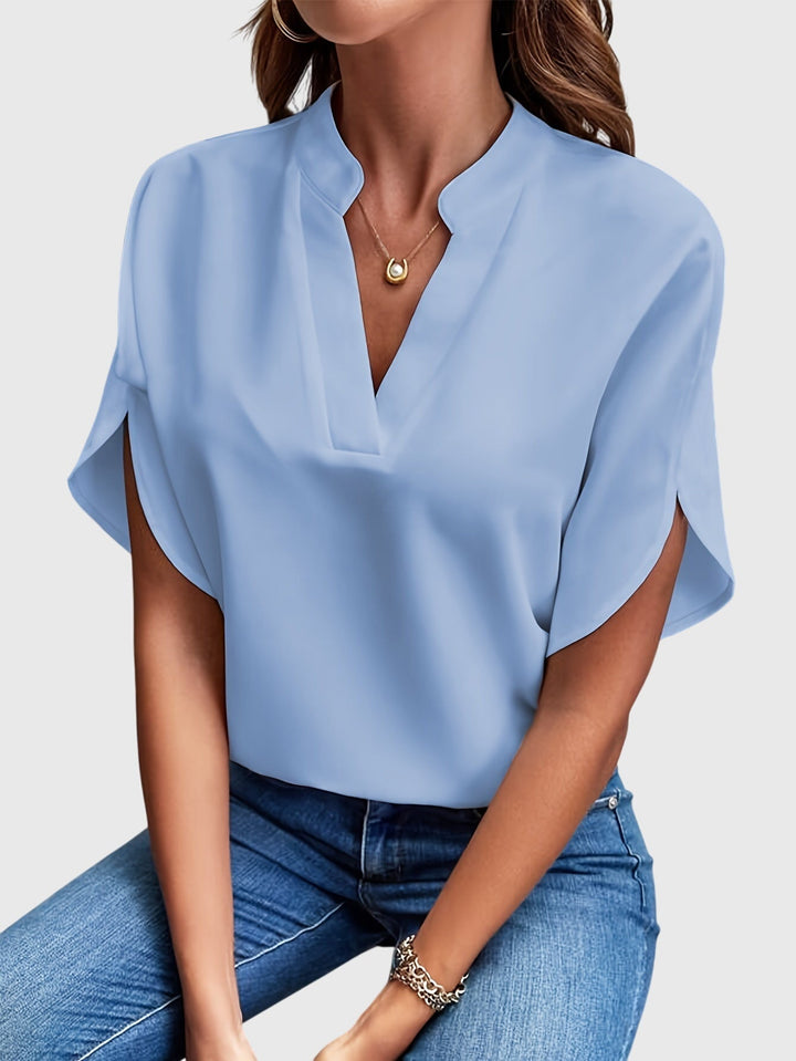 Chic women's apparel: a versatile elegant top, perfect for office or stylish casual outfits.