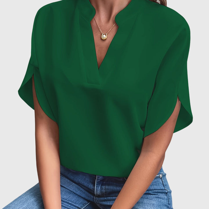 Chic women's office attire: a versatile elegant top, perfect for professional and casual settings.
