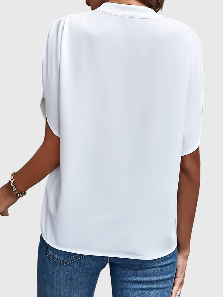 Fashionable long sleeve women's blouse, a chic top for any formal or casual occasion.