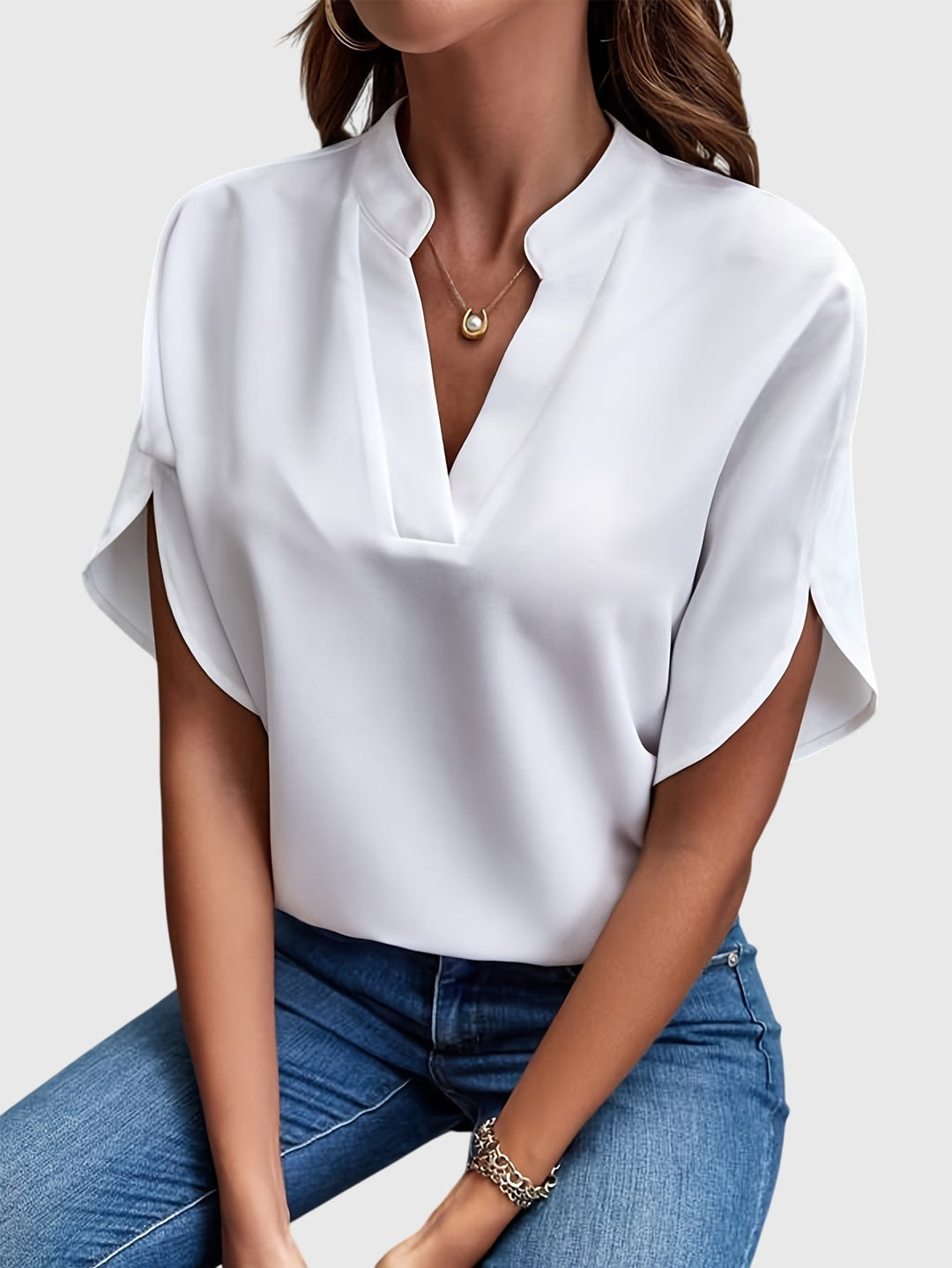 Stylish women's elegant top, great for office attire or a sophisticated casual look.