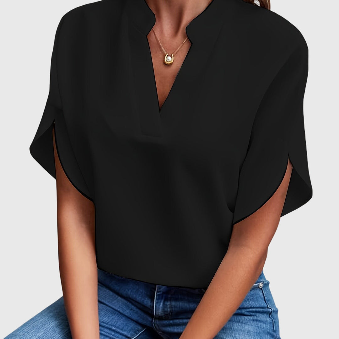 Chic women's versatile blouse, ideal as a formal top or smart casual shirt.