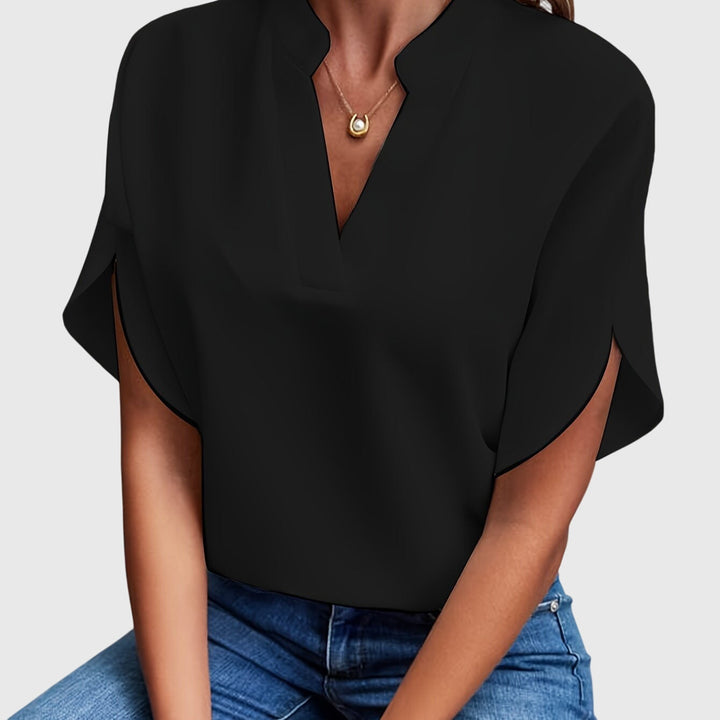 Chic women's versatile blouse, ideal as a formal top or smart casual shirt.