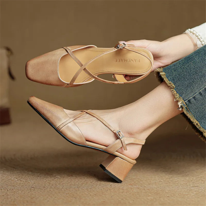 Professional women's pumps: sleek closed toe, comfortable block heel for long-lasting wear.