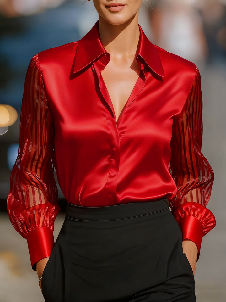 Professional women's flowing blouse, ideal for office wear or an elegant evening out.