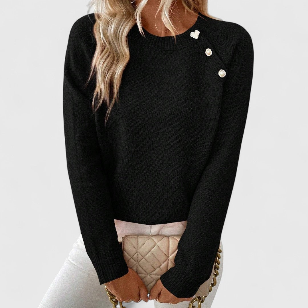 Women's elegant crew neck pullover sweater with delicate pearl shoulder trim. Chic & versatile long sleeve top.