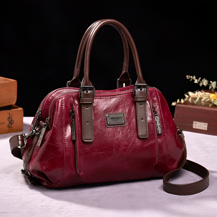 Fashionable women's Boston bag, croc embossed leather texture, versatile top handle & shoulder strap for classic style.
