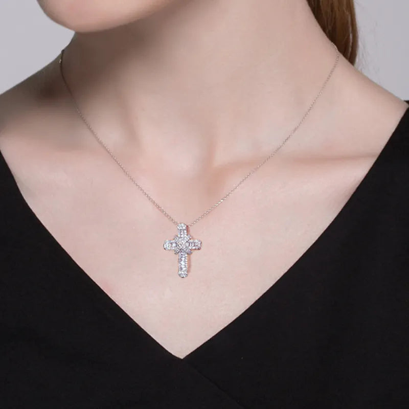 Women's elegant crystal cross charm necklace. Features a sparkling crystal cross pendant on a durable stainless steel chain.