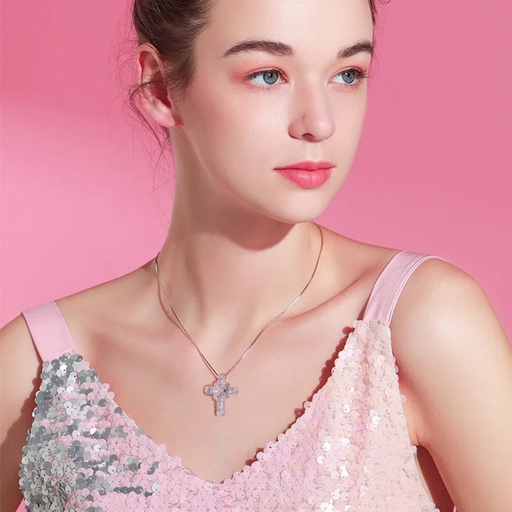 Stylish women's crystal cross charm necklace, combining modern design with spiritual elegance. A must-have accessory.