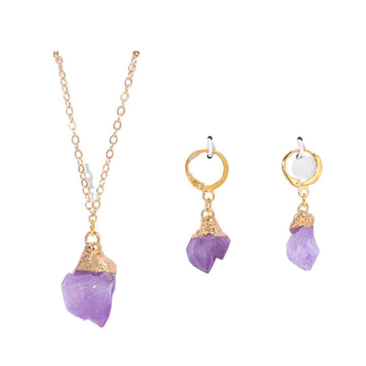 Artistic display of an elegant women's crystal necklace & earrings jewelry set, perfect gift.