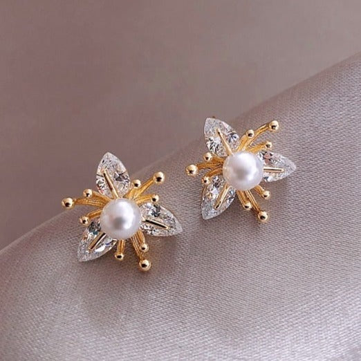 Women's elegant crystal & pearl flower drop earrings. Perfect floral jewelry accessory.
