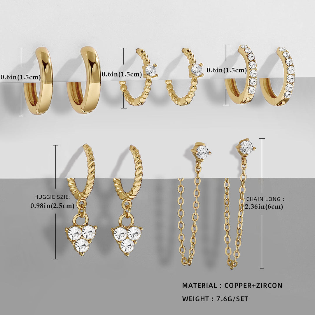 Gold crystal dangle earrings. Chic women's jewelry, perfect for a sophisticated look.