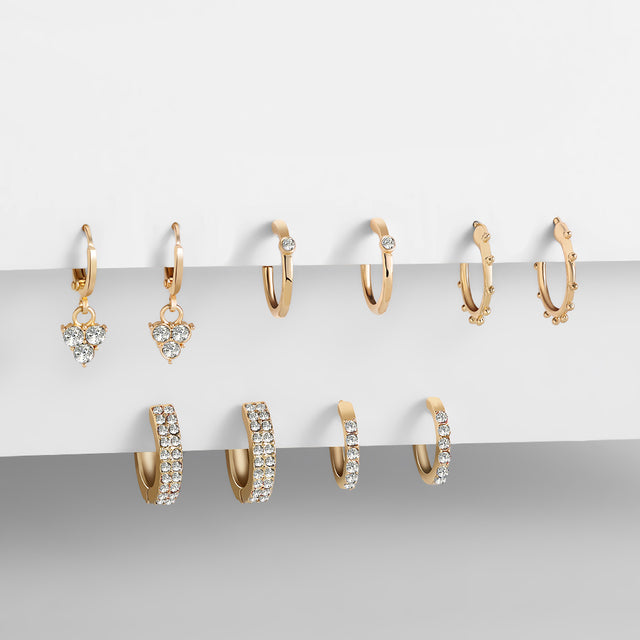 Gold dangle earrings with sparkling crystals. Hypoallergenic women's jewelry.