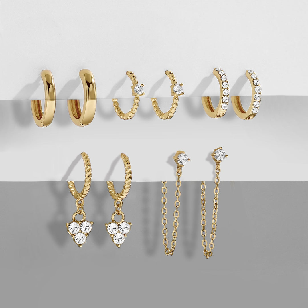 Women wearing elegant dangle earrings, enhancing her chic style. Fashion accessory.