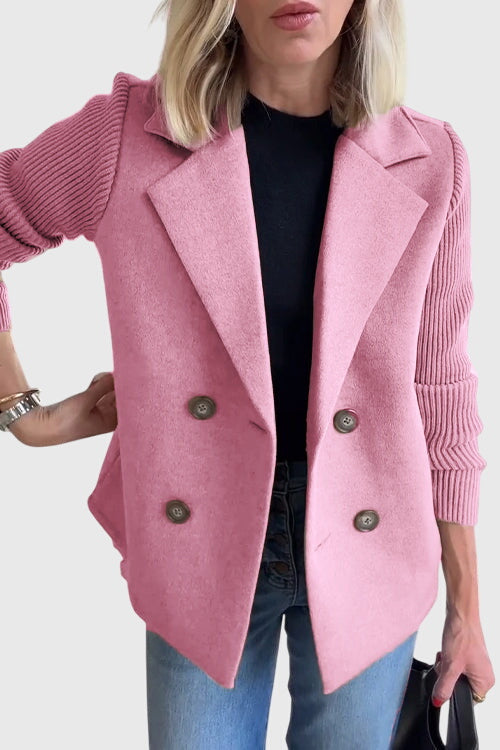Modern women's double-breasted blazer, showcasing sophisticated style & professional tailoring. Chic outerwear.