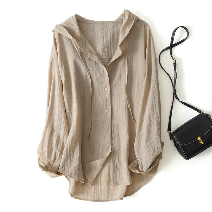 Breathable pink hooded blouse for women, featuring effortless drape & comfort. Ideal light spring/summer wear.