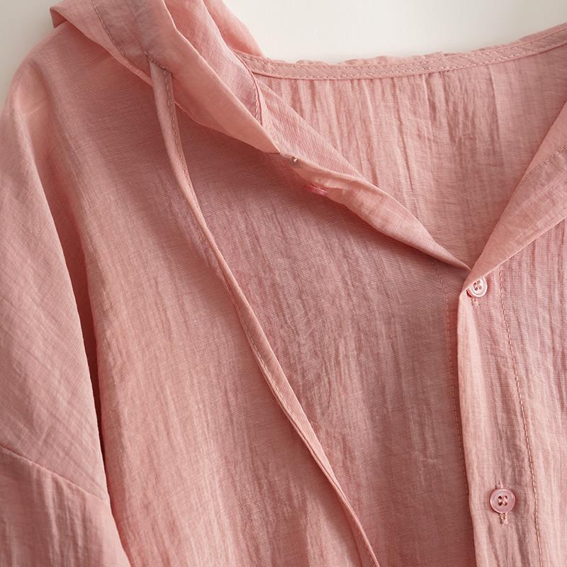 Comfortable women's drape hoodie blouse in white, ideal for elegant, light spring & summer outfits.
