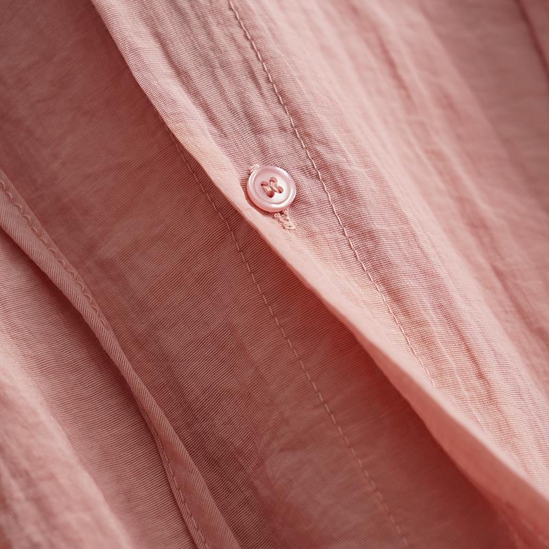 Versatile pink hooded blouse for women; effortless drape, breathable fabric, perfect for elegant spring/summer style.