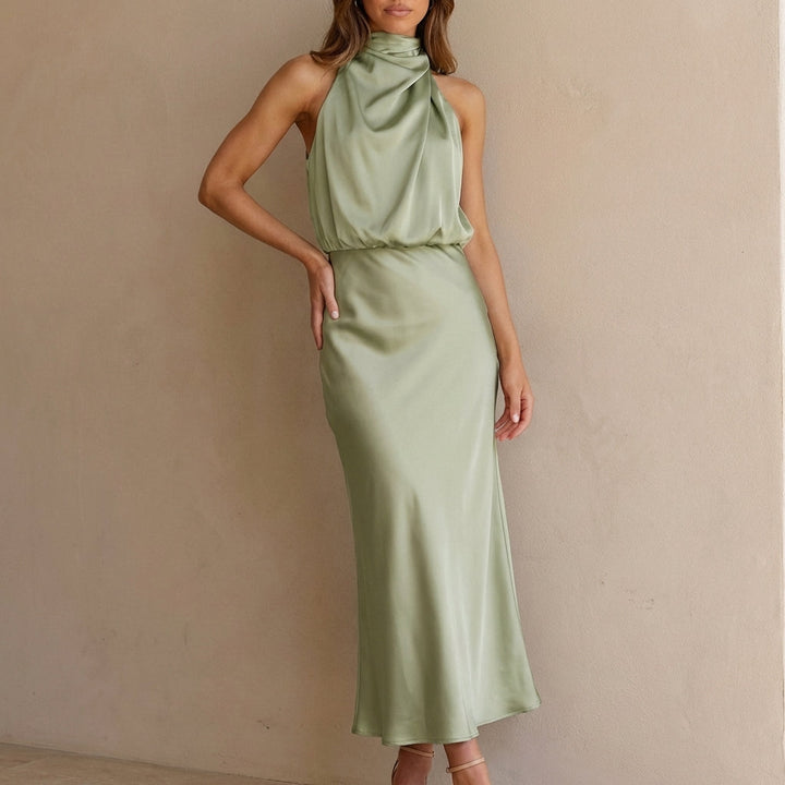 Elegant women's party dress with a draped halter neck, blouson waist. Perfect for special occasions.