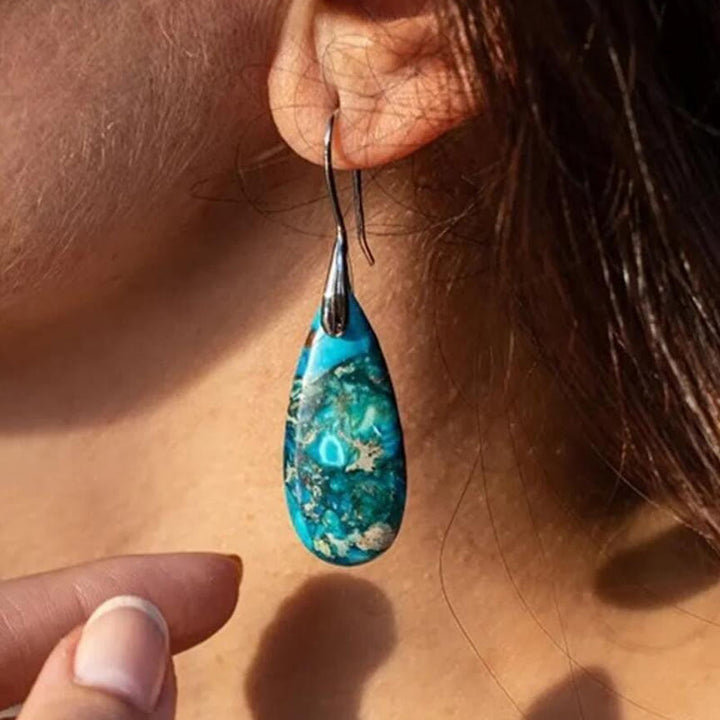 Chic women's emperor stone drop earrings; versatile silver plated natural gemstone design.