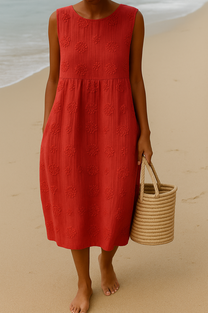 Stylish women's embroidered midi day dress, sleeveless, perfect for a comfortable and elegant summer look.