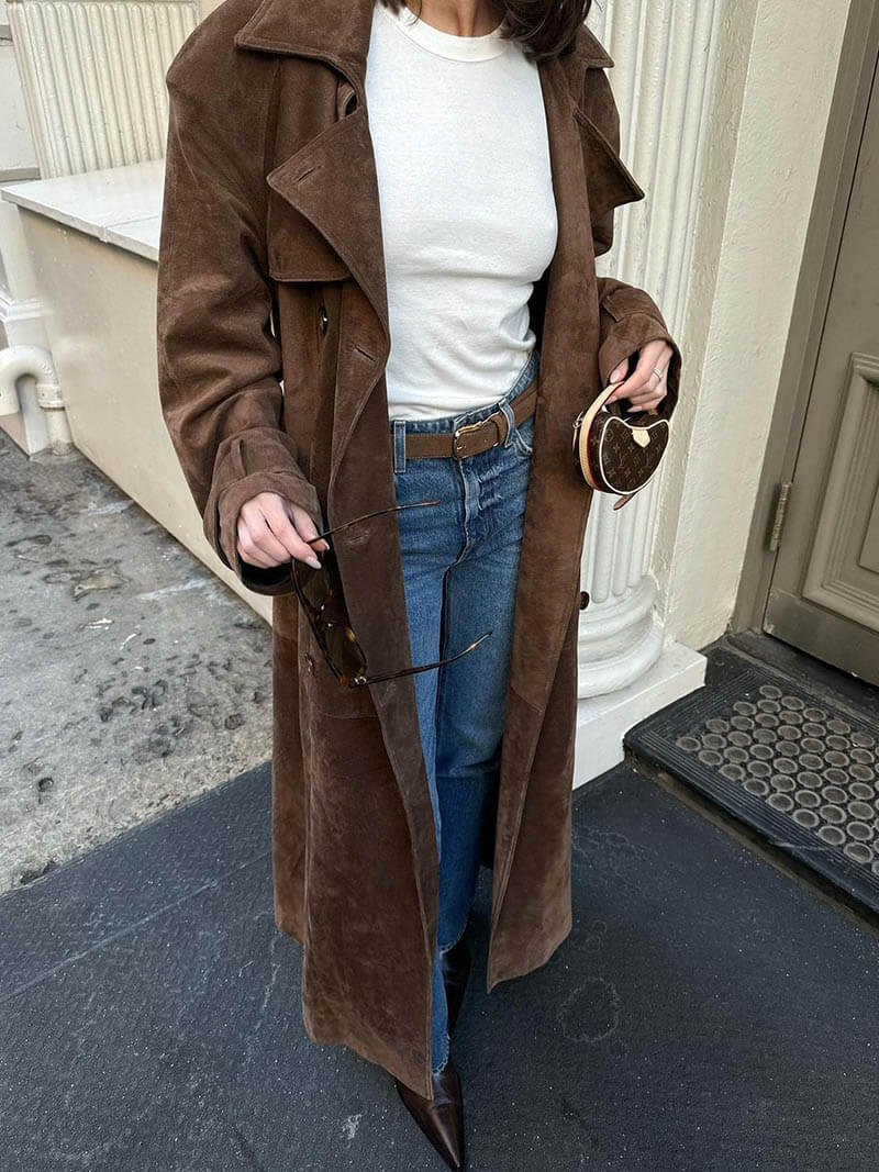 Warm women's elegant faux suede winter jacket, versatile for cold weather chic.